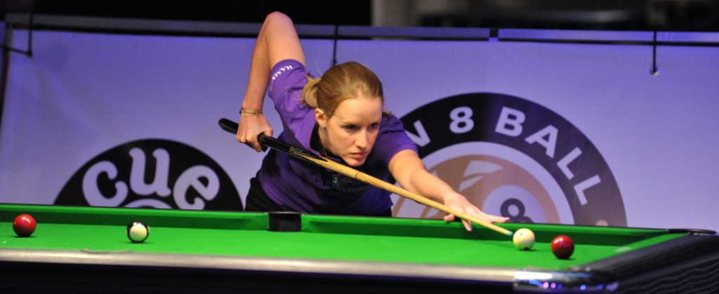 A ladies player lining up a shot on the show table