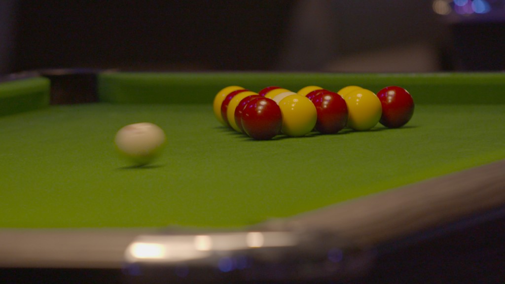 A racked set of reds and yellows waiting for the break
