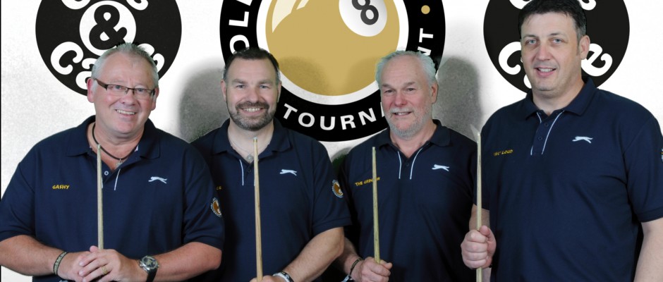 A team of four in matching shirts in front of the Golden 8 Ball backdrop
