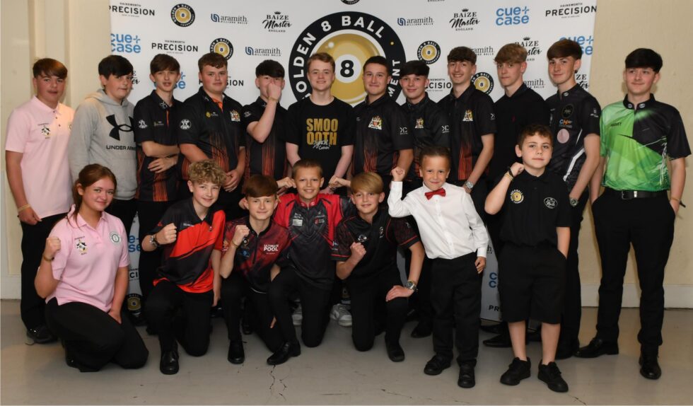 The 2025 junior field lined up in front of the Golden 8 Ball sponsor board